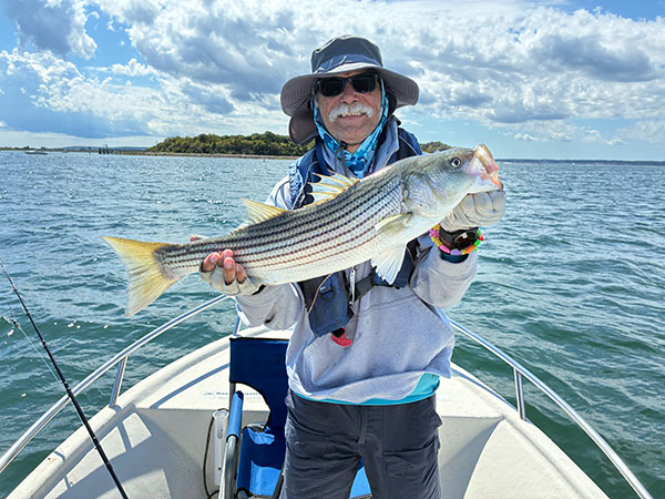 Week 5 Boat winner Mike Laprade of Granby, MA with his striped bass