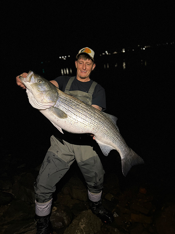 Week 2 Shore winner Tyler Momrow of Troy, NY with his striped bass