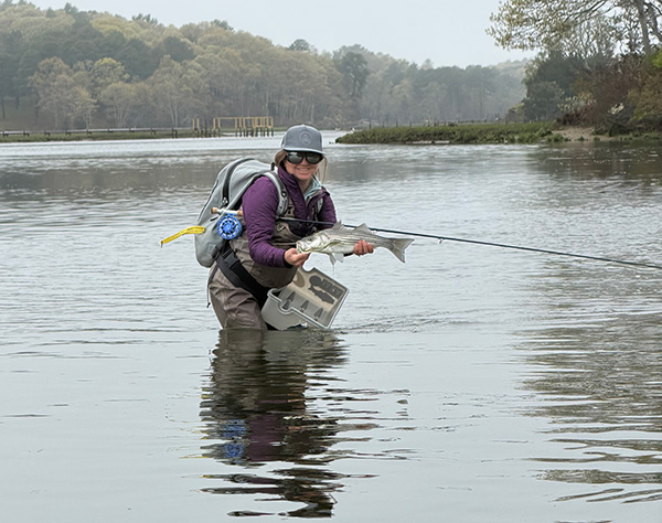 Week 3 Fly Bonus winner Caitlin Jones of Danvers, MA with her striped bass
