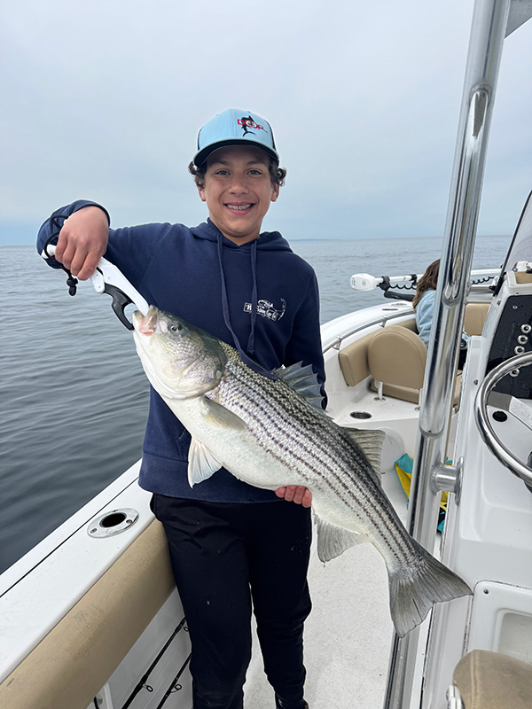 Youth Catch of the Week winner Micah Gonyer of Plymouth, MA with his striped bass