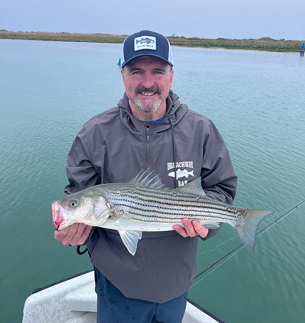 Week 4 Boat winner Tom ODonnell of Charlestown, RI with his striped bass