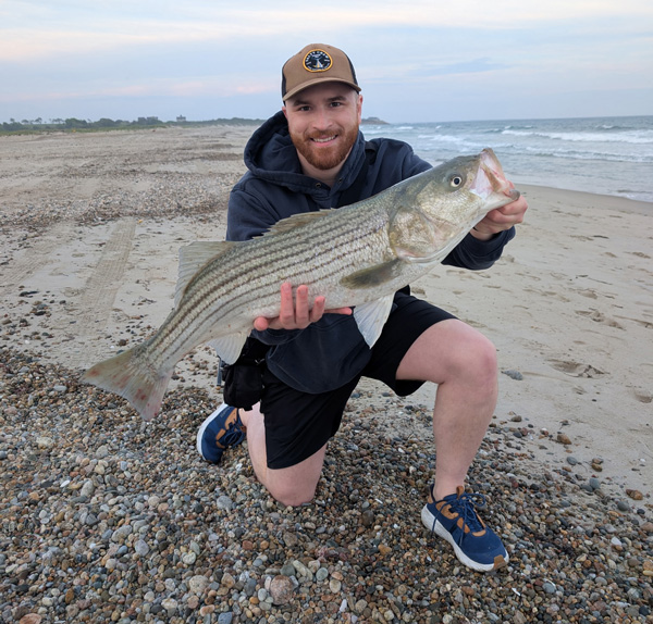 Week 7 Shore winner Adam Belkadi of Cambridge, MA with his striped bass