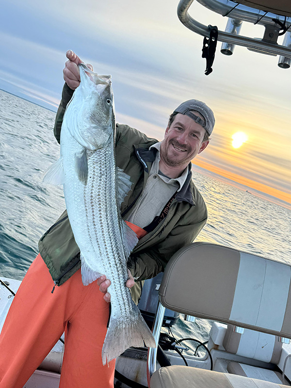 Week 16 SIMRAD Special winner Nyder Menezes of Edgartown, MA with their striped bass