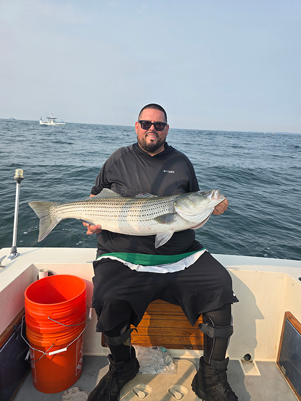 Week 12 Boat winner Bobby Brierly of Cranston, RI with his striped bass