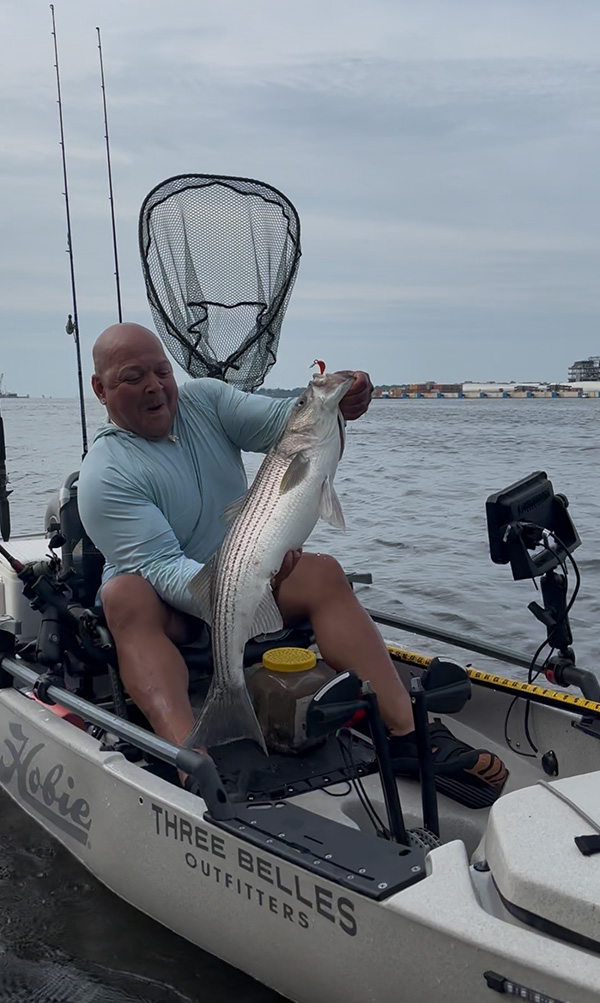 Week 14 Kayak winner David Medina of Plymouth, CT with his striped bass