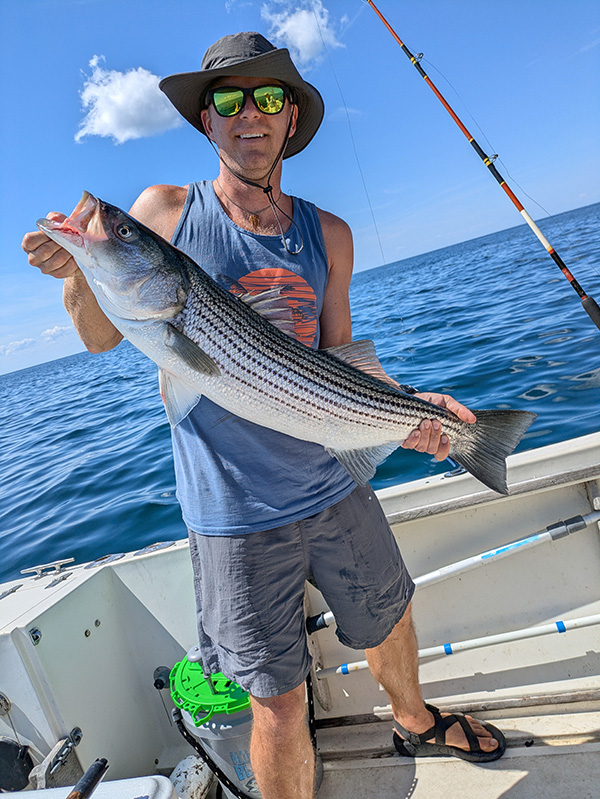 Week 16 Boat winner Conor Driscoll of Easthampton, MA with his striped bass