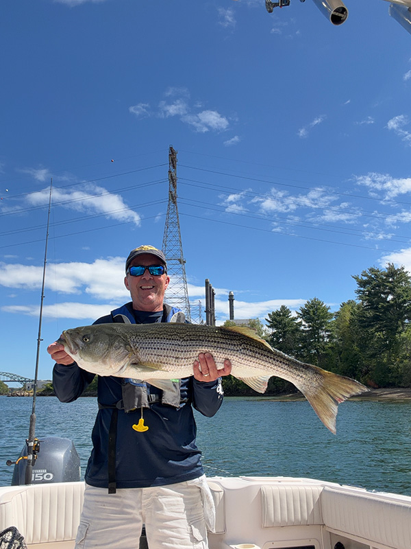 Week 18 Boat winner Bryan Marshall of Nashua, NH with his striped bass