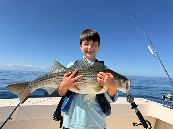 Youth Catch of the Week winner Nolan Costa of Pembroke, MA with his striped bass