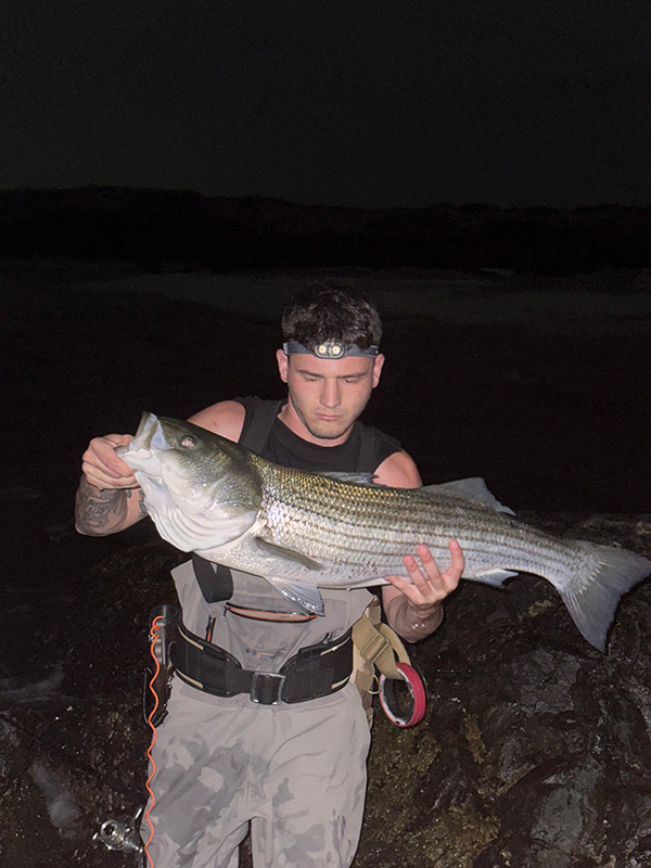Week 18 Shore winner Tyler Macari of Narragansett, RI with his striped bass