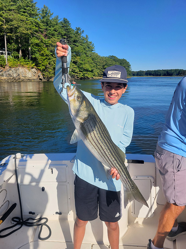 Youth Catch of the Week winner Vincent Cappola of Southington, CT with his striped bass